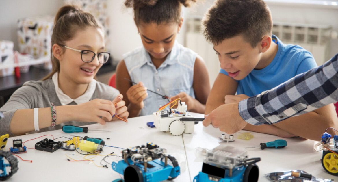Kids working on a robot design Inspiring future STEM leaders