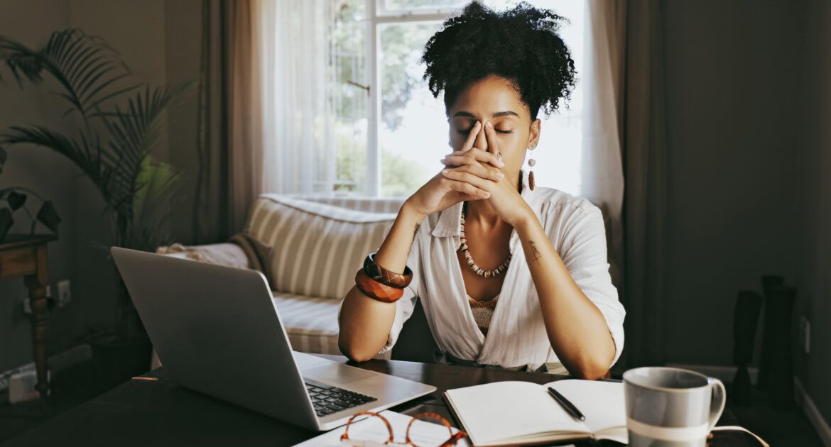 young woman stressed while working